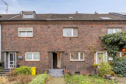 Außenansicht - Charmantes Klinker-Reihenhaus mit Garten und überdachter Verandaterrasse