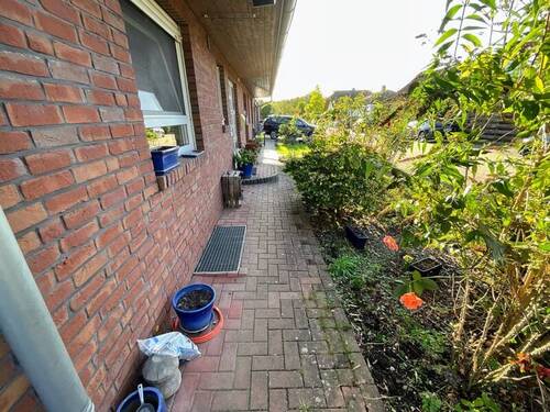 Vorgarten - Doppelhaushälfte mit 105,00 m² in Wendeburg zum Kaufen