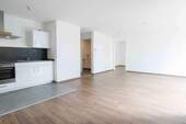 Wohnzimmer... - Bezugsfreie, moderne Bauweise und energieeffizient: 2-Zimmer mit Balkon und TG in Steinbach (Taunus)