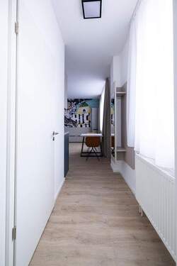 Bild 1 - *Universitäten fußläufig erreichbar* 2-Zimmer-Neubauwohnung mit moderner Einbauküche WE 77