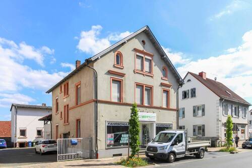 Außenansicht - Attraktive Gelegenheit: MFH mit 4 WE und einer GE sowie Wertsteigerungspotenzial in Innenstadtlage