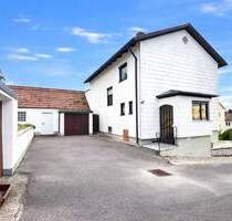 Charmantes Einfamilienhaus mit großem Grundstück und Ausbaupotenzial in Wolnzach!