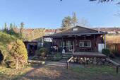 Außenansicht - Freistehendes Einfamilienhaus in ruhiger Lage von Köln-Dellbrück mit großzügigem Garten und flexible