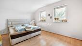 1. OG Schlafzimmer 1 - 