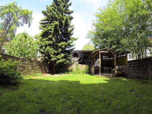 Garten - !!! ImmoPoint !!! WohnGeschäftshaus (3+1) mit Jugendstilfassade & Garten !!! NEUE FERNWÄRMEHEIZUNG 2024 - Dachboden Ausbau möglich