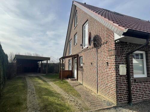 Paduaweg 12 - ZUR MIETE: Haushälfte mit überdachter Terrasse, Garten und Carport