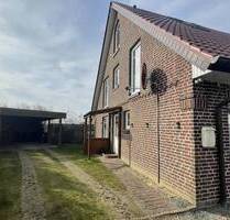 ZUR MIETE: Haushälfte mit überdachter Terrasse, Garten und Carport - Heiligenhafen