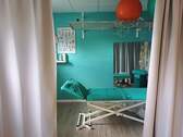 Behandlungsraum mit 2 Liegen - 