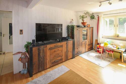 Wohnzimmer - Einfamilienhaus mit 88,30 m&sup2; in Düsseldorf zum Kaufen