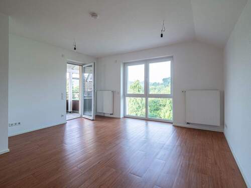 Wohnzimmer - Modernes, seniorengerechtes 2-Zimmer-Apartment mit Balkon in Arnsberg-Oeventrop