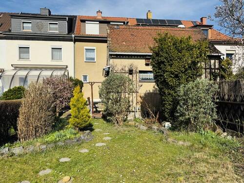 Gartenansicht - Raumwunder auf vier Etagen. Wohn-und Nutzfläche 133 m².