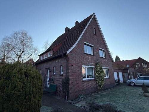 Ansicht - 6 Zimmer Mehrfamilienhaus, Wohnhaus zum Kaufen in Varel / Obenstrohe