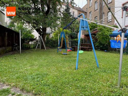 Gemeinschaftsgarten - Mehrfamilienhaus, Wohnhaus in Frankfurt am Main / Fechenheim