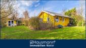 Hausansicht - Charmantes Ferienhaus mit Kamin und großem Garten unmittelbar am Nehmser See!