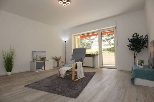 Wohnzimmer - Barrierefreie helle Erdgeschosswohnung Erstbezug nach Kernsanierung