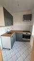 Einbauküche mit Herd-/Ofen - MODERNISIERTE 2-ZI WOHNUNG MIT NEUER EBK & PRAKTISCHEM ABSTELLRAUM