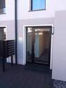 Hauseingang, Nordseite - Stukenbrock: Neubau-ETW W3 im EG 