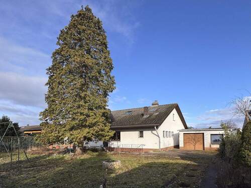 Bild 1 - Viel Platz zum Leben: Freistehendes Einfamilienhaus mit großem Garten und Doppelgarage in Gernsheim