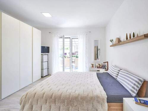 Beispiel-Schlafzimmer - Doppelhaushälfte mit 150,00 m&sup2; in München zum Kaufen