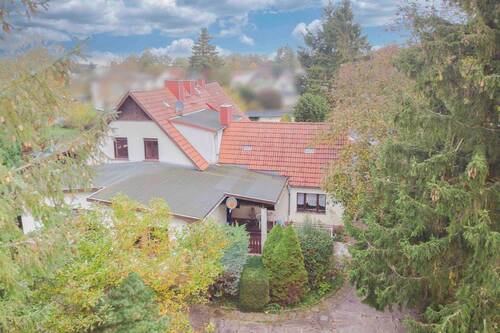 Außenansicht II - Zuhause inkl. Garten, 2 Garagen und Carportstellplatz in Wassernähe