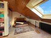Schlafzimmer im Dachgeschoss - 