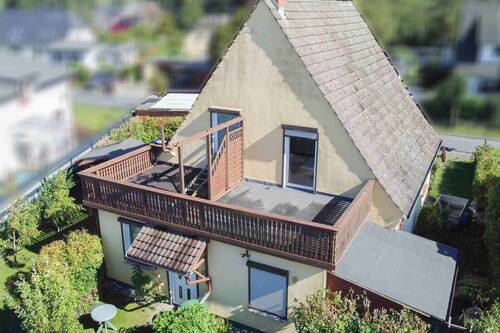 Rückansicht mit Dachterrasse - Einfamilienhaus mit 120,20 m&sup2; in Baabe zum Kaufen