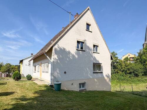 Seitenansicht - 6 Zimmer Mehrfamilienhaus, Wohnhaus zum Kaufen in Hamm/Sieg