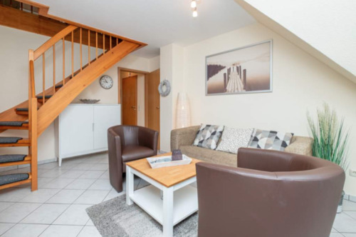 Treppe zum oberen Bereich - Etagenwohnung mit 60,00 m² in Timmendorfer Strand zum Kaufen