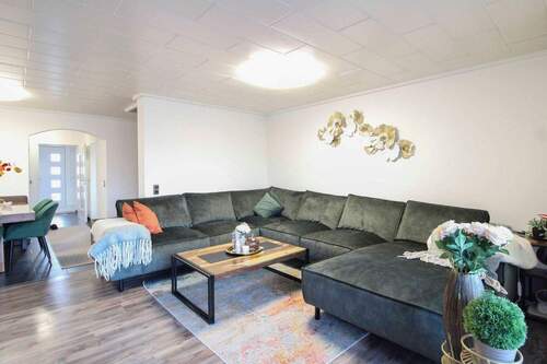Wohnzimmer - Reihenmittelhaus mit 148,00 m² in Delmenhorst zum Kaufen