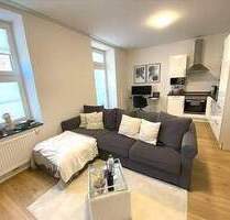 Frei ab 01.04.2026 2 - Zimmer-Wohnung im 1. Obergeschoss mit Aufzug Einbauküche Balkon - Bitburg