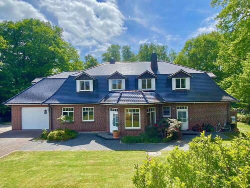 Frontseite - Mehrfamilienhaus, Wohnhaus mit 352,00 m&sup2; in Quickborn zum Kaufen