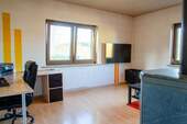 Wohnzimmer EG mit Ofen - 
