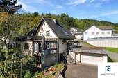 Außenansicht - Ruhig wohnen in Simmertal: Großzügiges EFH mit Wintergarten, Dachterrasse & optionalem Baugrundstück