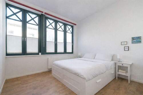 Schlafzimmer visualisert - 2 Zimmer Etagenwohnung in Borkum