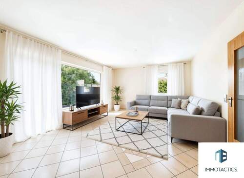 Wohnzimmer - (KI generiert) - Eingefriedeter Bungalow mit großem Garten, zusätzlichem Wohnraum & drei Garagen in Bad Kreuznach