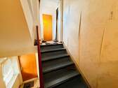 27 Treppenhaus Wohnung DG - 