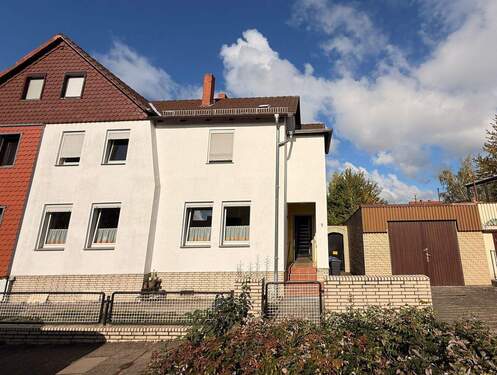 2 Hausansicht - 8 Zimmer Mehrfamilienhaus, Wohnhaus zum Kaufen in Northeim