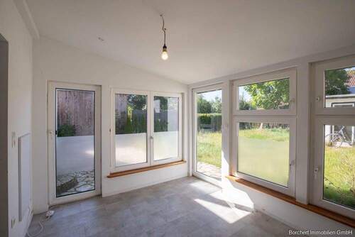 WE 1: Wintergarten - 7 Zimmer Mehrfamilienhaus, Wohnhaus in Krempe