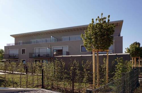 Ansicht des Hauses - 3 Zimmer Terrassenwohnung zur Miete in Kirchheim bei München