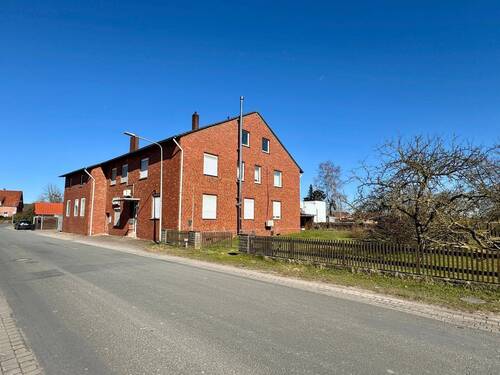 Seitenansicht - Mehrfamilienhaus, Wohnhaus mit 350,00 m² in Wunstorf zum Kaufen