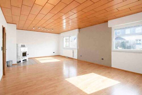 03_Wohnzimmer_EG - 3 Zimmer Einfamilienhaus in Gründau