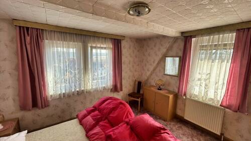 Zimmer im Dachgeschoss - 
