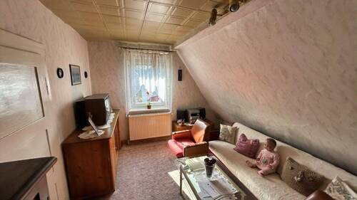 Zimmer im Dachgeschoss - 