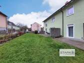 Außenansicht Gartenseite.jpg - Voll vermietetes Vierfamilienhaus mit DG-Ausbauoption – jetzt zu verbesserten Konditionen!