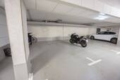 Tiefgaragenstellplatz 21 - 
