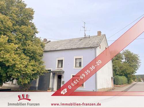 Titelbild - Haus mit Potenzial: Einfamilienhaus in ruhiger Lage mit Garten und Scheune!