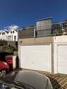 Garage und Pkw-Stellplatz - 