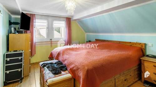 1. OG Schlafzimmer 1 - 