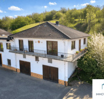 Einfamilienhaus mit umlaufendem Balkon und zwei großen Maxi-Garagen und Weitblick in Guldental