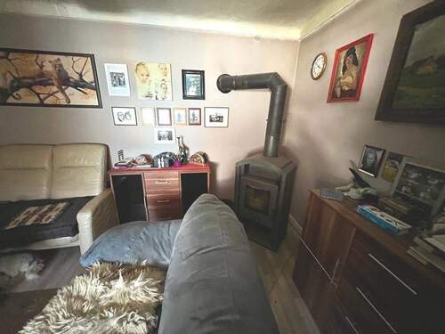 Wohnzimmer EG mit Kamin - 